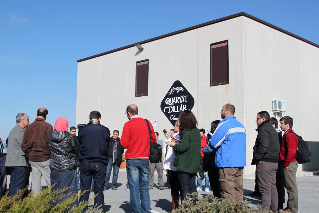 group of adults visit the Quaryat Dillar oil mill with the aim of learning about the processes and stages of extraction of a good extra virgin olive oil, the Sierra Nevada oil